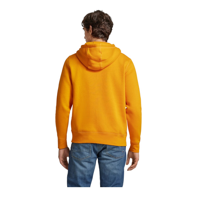 TOMMY HILFIGER OCIEPLANA BLUZA MĘSKA TOMMY LOGO HOODY POMARAŃCZOWA MW0MW11599 SG3