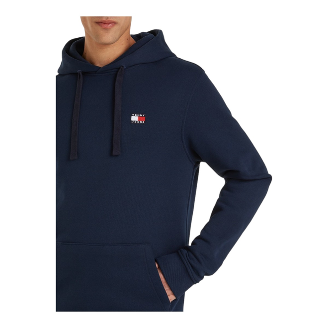 TOMMY HILFIGER BLUZA MĘSKA Z KAPTUREM TJM REG BADGE HOODIE EXT GRANATOWA DM0DM17988 C1G